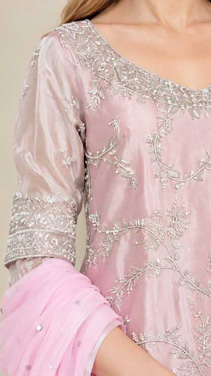 Close-up detail of silver embroidery, scoop neckline, and 3/4 sleeves on Blush Pink kurta