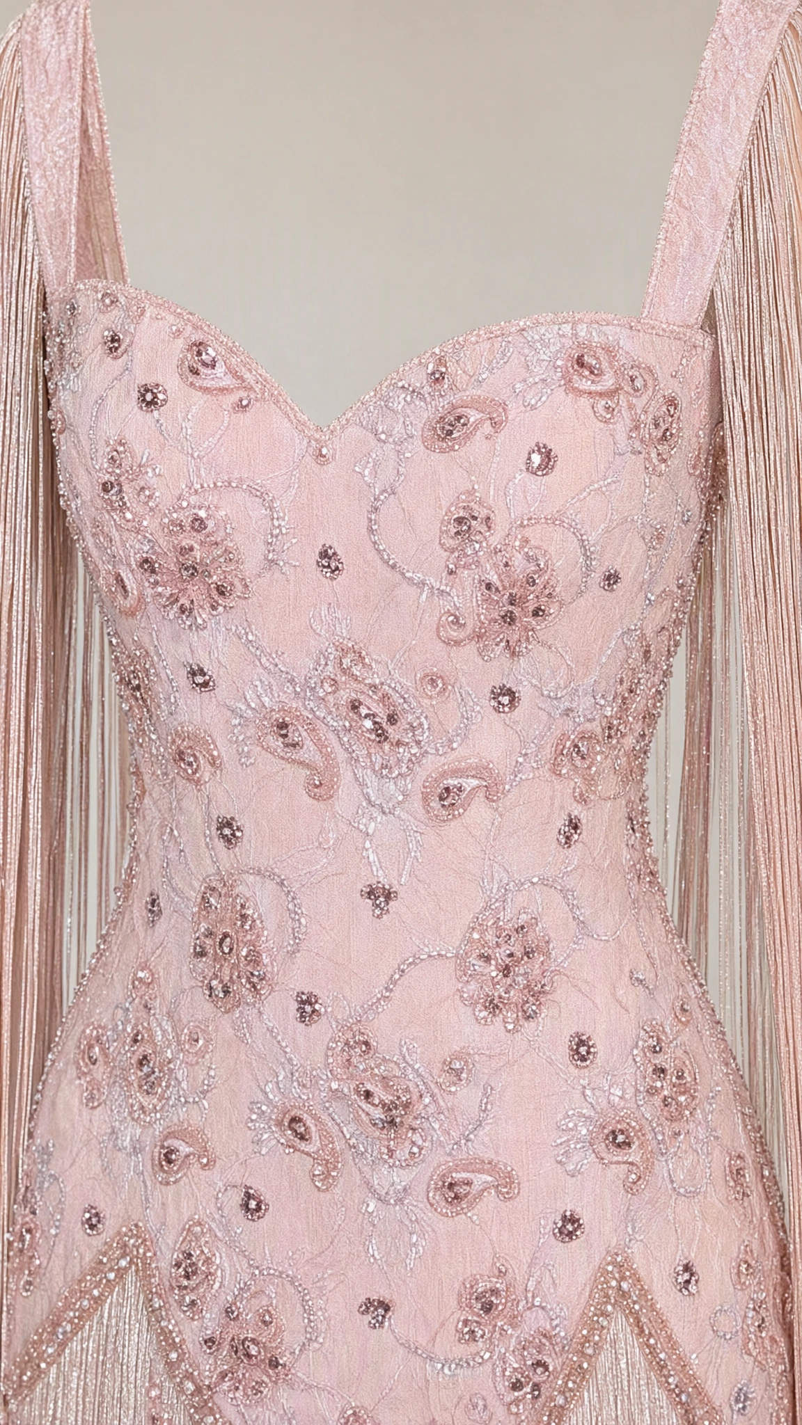 Close-up detail of beaded floral embroidery on sweetheart bodice