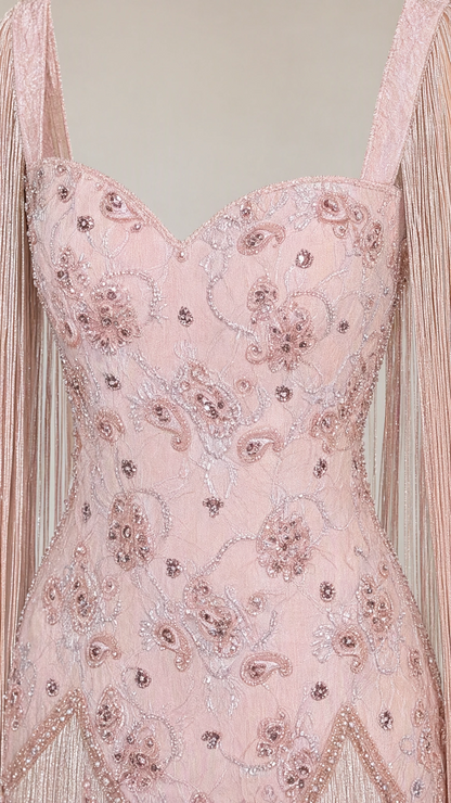 Close-up detail of beaded floral embroidery on sweetheart bodice