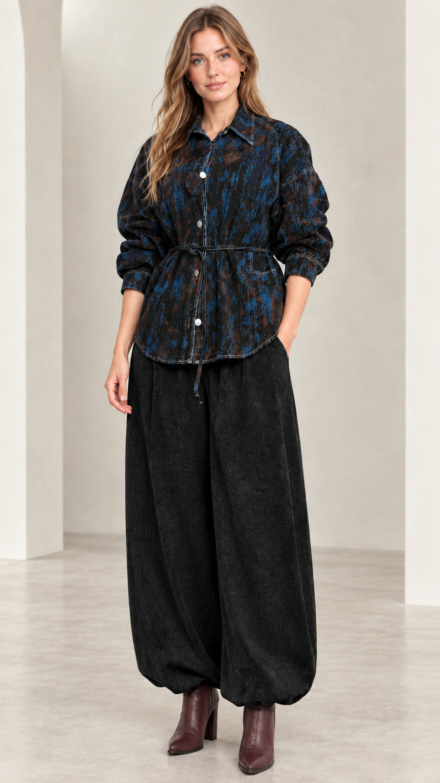 Model wearing Midnight Blue abstract print tie-waist button-down shirt jacket