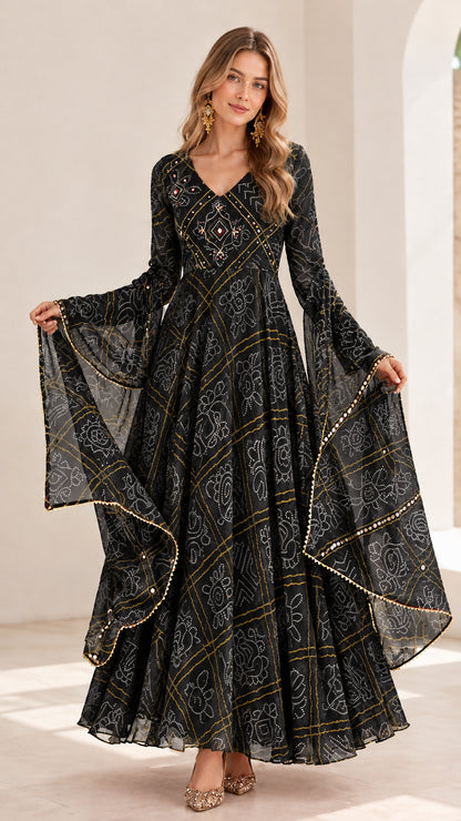 Model wearing black geometric printed bell sleeve maxi dress