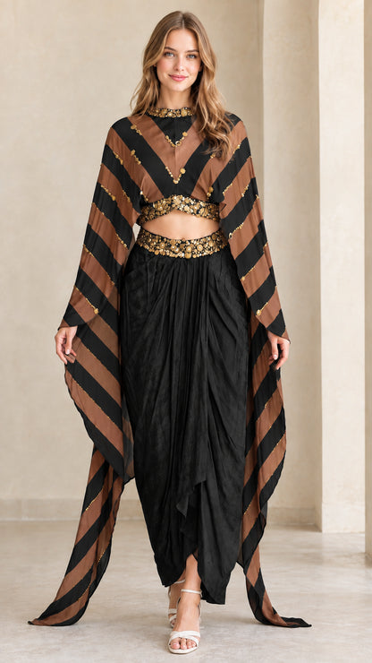 Model wearing Black striped cape top and matching draped dhoti pant set