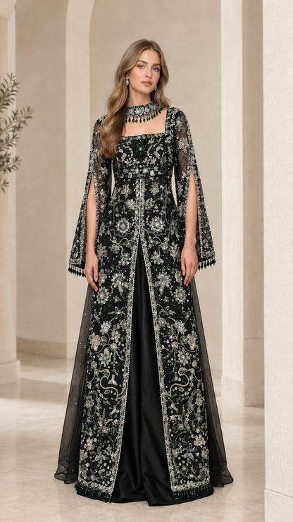 Black embroidered formal evening gown with long split cape sleeves and beaded detailing