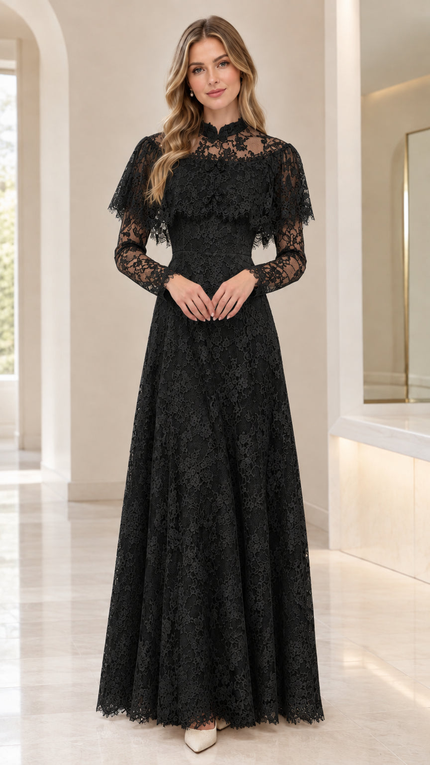 Front view of woman wearing black lace capelet maxi evening gown