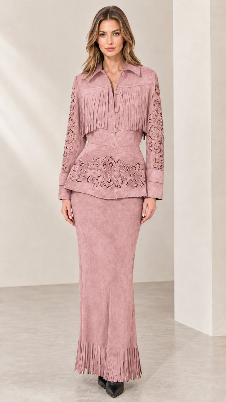 Full front view of dusty pink fringe faux suede peplum jacket and maxi skirt set