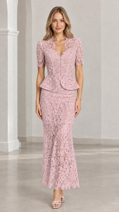 Front view of woman wearing dusty pink floral lace peplum maxi two-piece set
