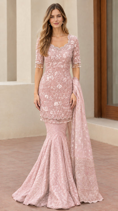 Front view of dusty rose pink embroidered lace evening gown with mermaid skirt
