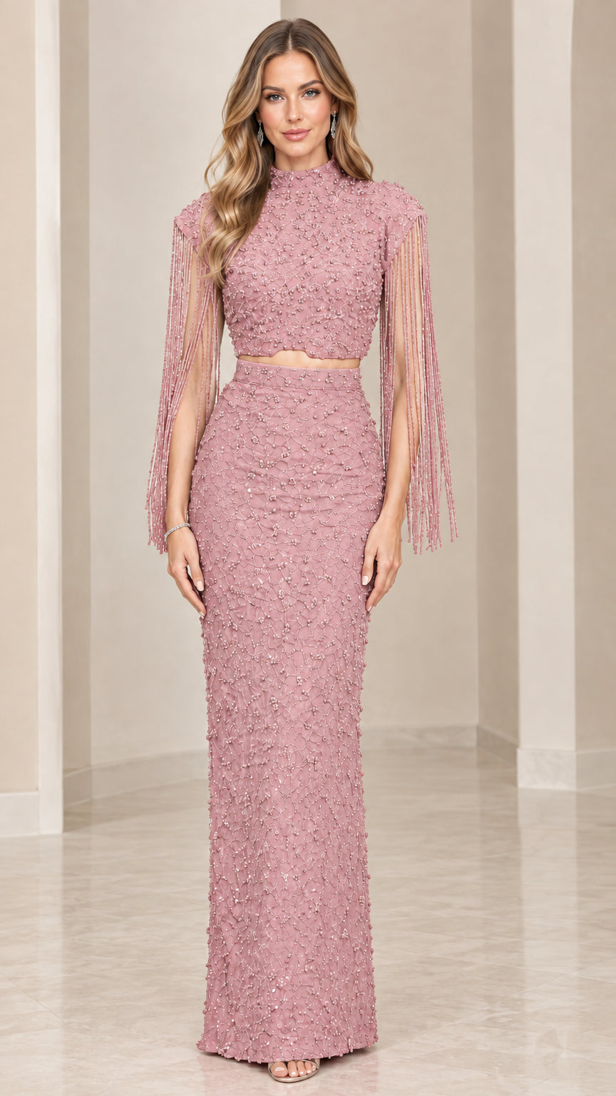 Front view of dusty rose beaded two-piece formal maxi dress set with fringe