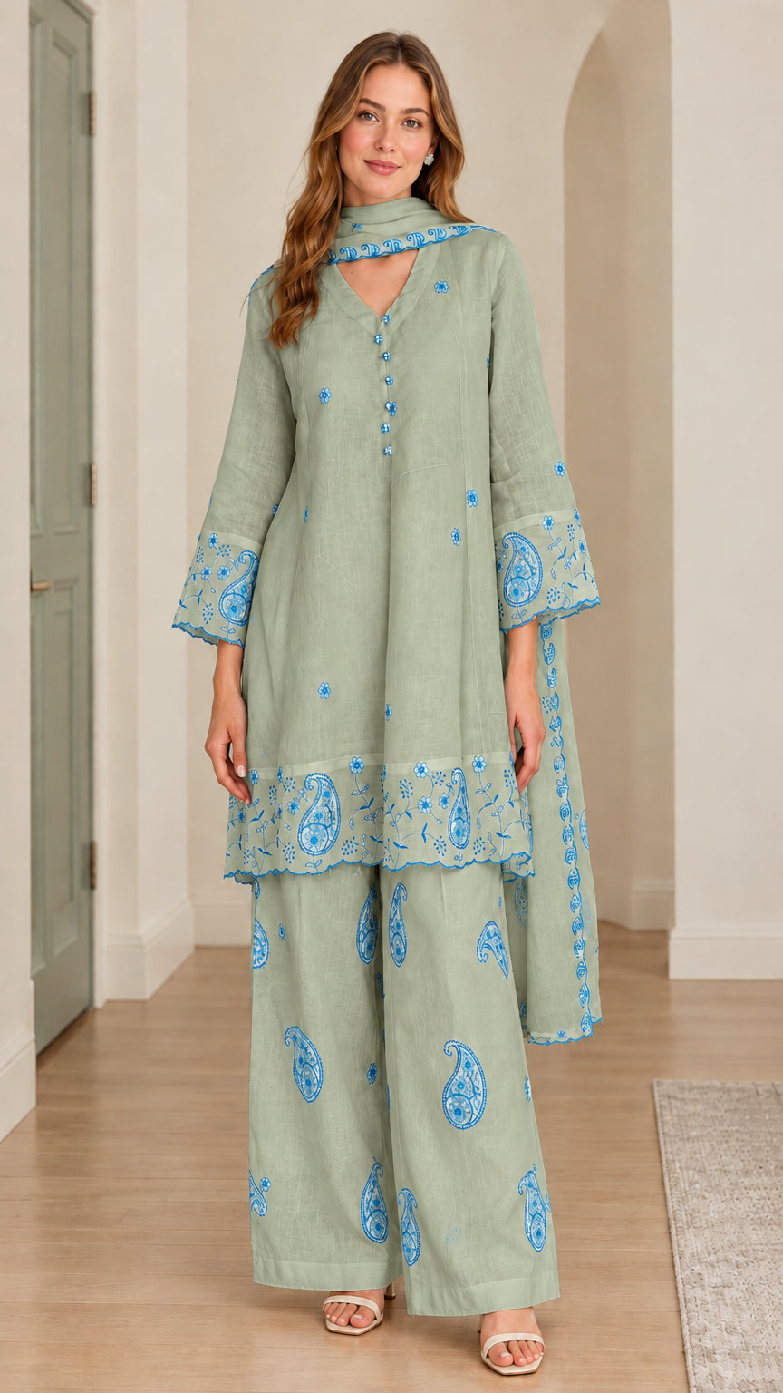 Model wearing sage green 3-piece embroidered tunic set with wide-leg pants