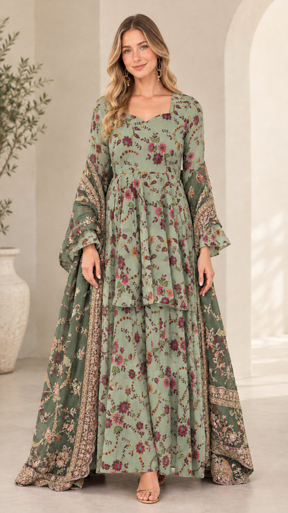 Model wearing sage green floral tiered maxi dress with coordinating scarf