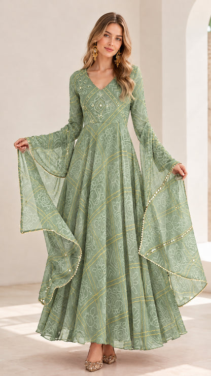 Model wearing sage green printed flared maxi dress with angel sleeves