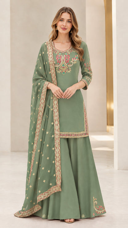 Front view of sage green embroidered sharara suit set with dupatta