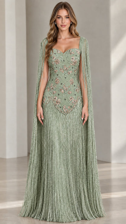 Model wearing sage green embroidered fringe evening maxi dress