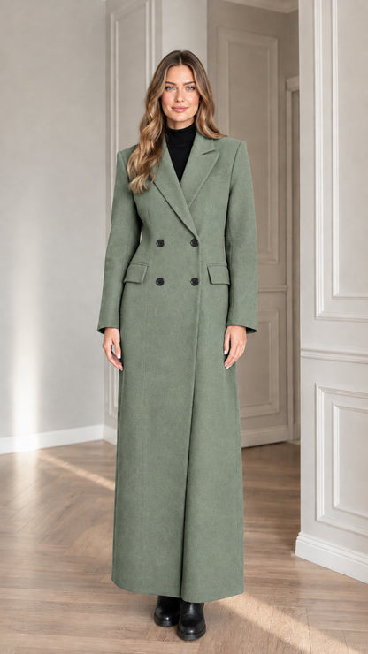 Full-length front view of woman wearing sage green double-breasted maxi coat