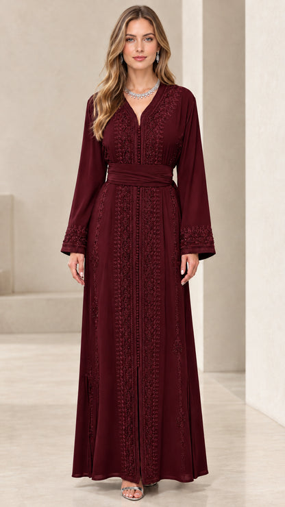Full front view of burgundy long sleeve embroidered kaftan dress
