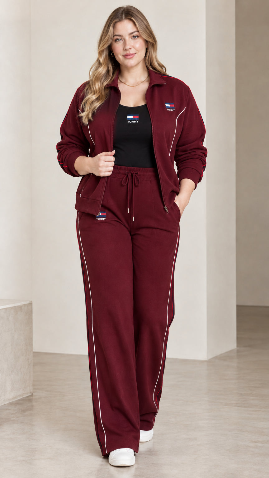 Front view of model wearing the burgundy red contrast piping tracksuit set