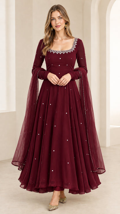 Front view of woman wearing Burgundy Wine long sleeve flared festive gown with dupatta