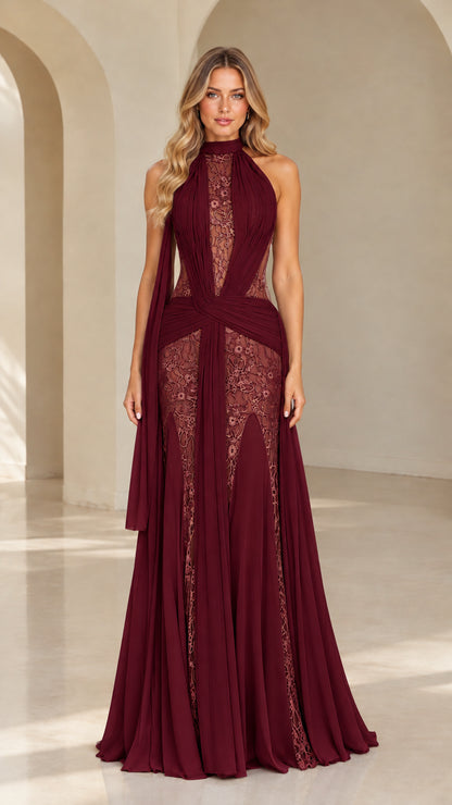 Full-length view of burgundy red halter lace pleated evening gown