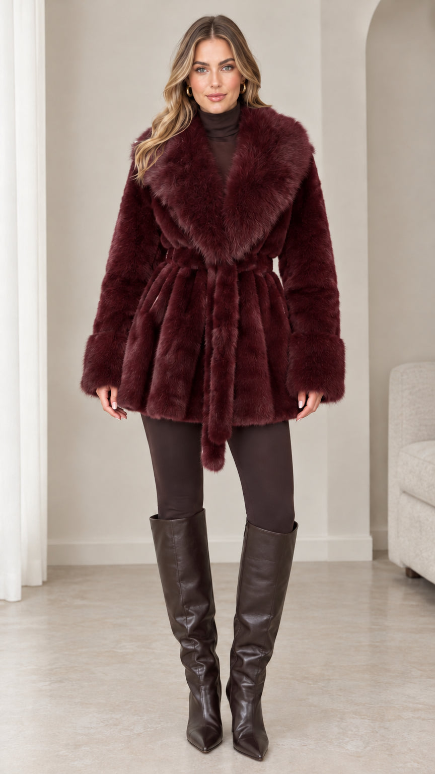 Front view of model wearing burgundy red plush faux fur belted coat