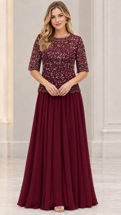 Model wearing Burgundy wine sequin top floor-length evening gown