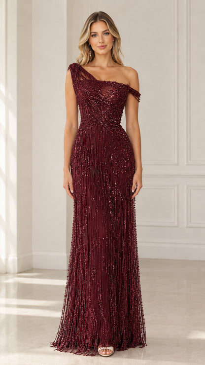 Model wearing Burgundy wine-colored one-shoulder beaded maxi dress