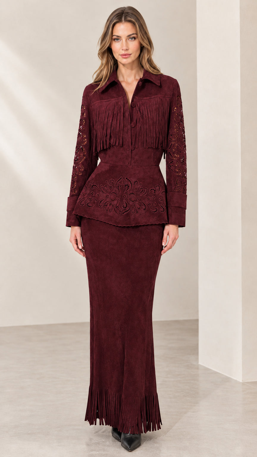 Full front view of burgundy wine fringe faux suede peplum jacket and maxi skirt set
