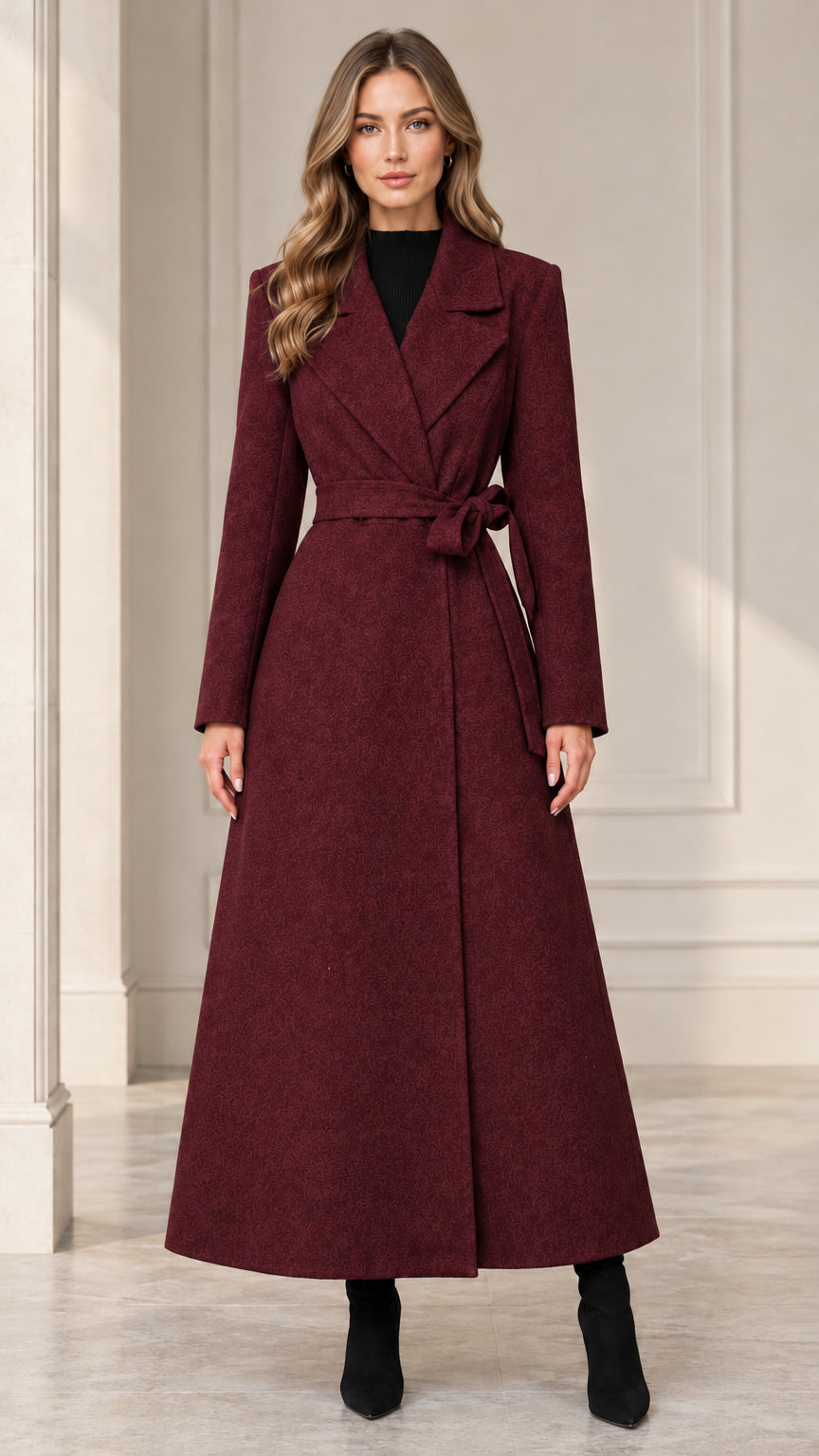 Front view of woman wearing the deep burgundy belted maxi wrap coat