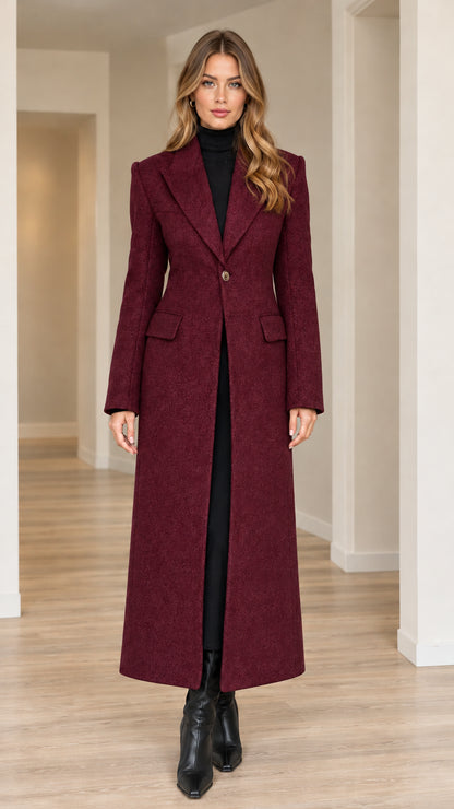 Model wearing burgundy red longline tailored overcoat