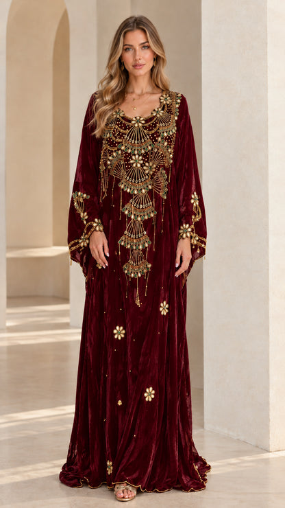 Front view of woman wearing Burgundy wine red embellished velvet kaftan dress
