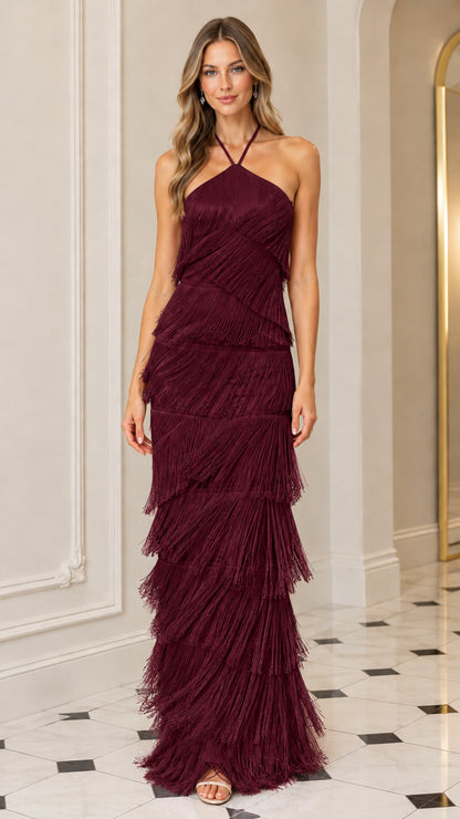 Model wearing Burgundy wine red tiered fringe halter maxi gown