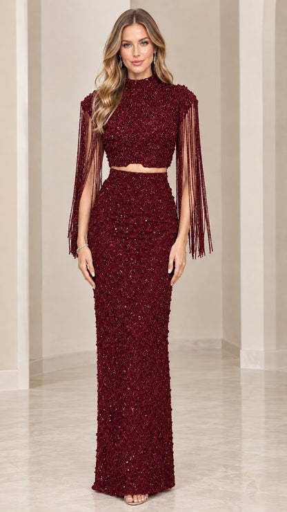 Front view of burgundy wine beaded two-piece mock neck formal gown set