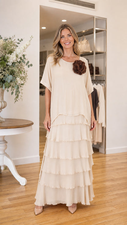 Model wearing beige tiered ruffle maxi dress