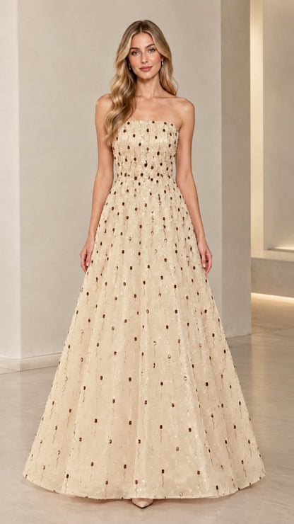 Model wearing Champagne gold strapless sequin formal evening dress