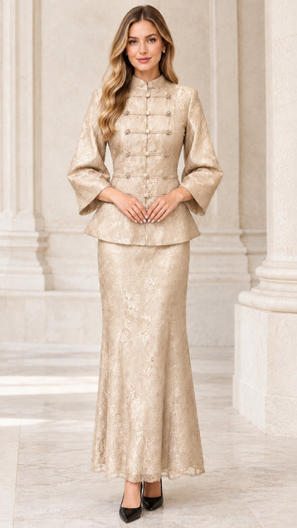 Front view of model wearing champagne gold lace peplum jacket and maxi skirt set