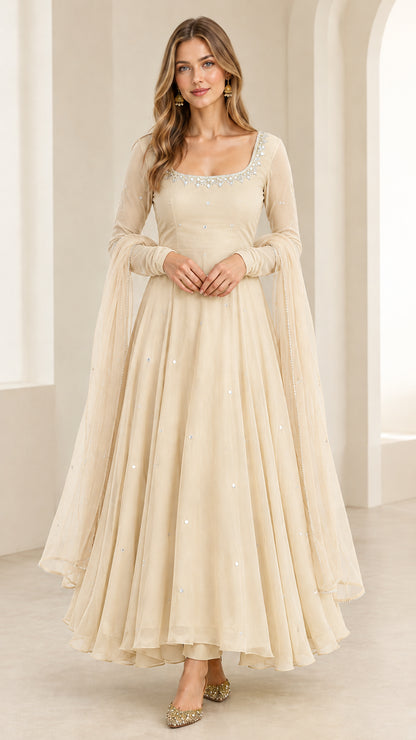 Front view of woman wearing Champagne Beige embroidered Anarkali dress with dupatta